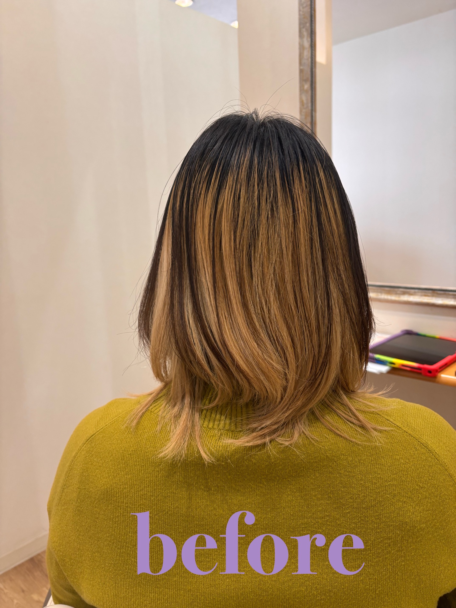 イメチェン前の状態。退色したロングヘアからショートへの大胆チェンジをご希望のお客様
